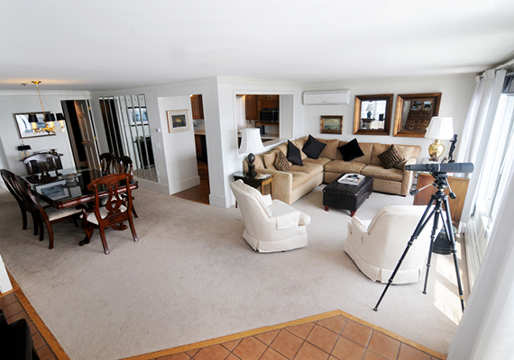 Waterfront 3+ Bed, 2 Bath Apartment. Includes waterfront balcony with seating for 4, fully stocked kitchen, full dining room seating for 8, full living room with harbor and beach views, media room with fireplace, air conditioning and heating, WiFi, iHome, Comcast TV/DVD.