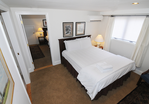 Waterfront 3+ Bed, 2 Bath Apartment. Includes waterfront balcony with seating for 4, fully stocked kitchen, full dining room seating for 8, full living room with harbor and beach views, media room with fireplace, air conditioning and heating, WiFi, iHome, Comcast TV/DVD.