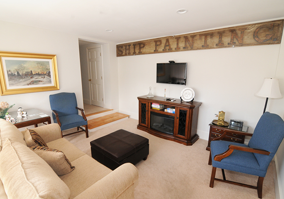 Waterfront 3+ Bed, 2 Bath Apartment. Includes waterfront balcony with seating for 4, fully stocked kitchen, full dining room seating for 8, full living room with harbor and beach views, media room with fireplace, air conditioning and heating, WiFi, iHome, Comcast TV/DVD.