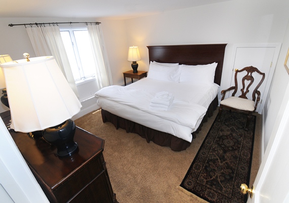 Waterfront 3+ Bed, 2 Bath Apartment. Includes waterfront balcony with seating for 4, fully stocked kitchen, full dining room seating for 8, full living room with harbor and beach views, media room with fireplace, air conditioning and heating, WiFi, iHome, Comcast TV/DVD.